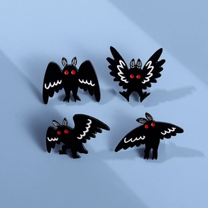 Gothic Mothman enamel pins set featuring black bats with red eyes for Halloween accessories