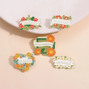 Set mit 5 Emaille-Anstecknadeln mit Blumen und Motivationssprüchen wie Mut