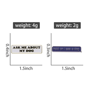Detail view of funny enamel dog pins with size specifications and weight on white background