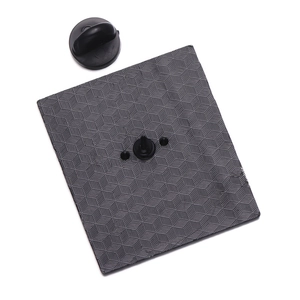 Square rainbow metal brooch back view with geometric texture and secure rubber pin clutch