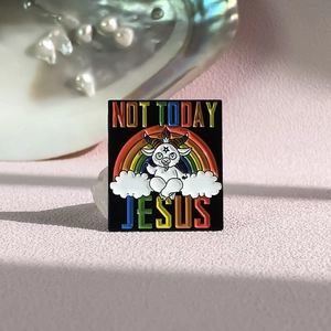 Artistic rectangular enamel pin featuring a goat on clouds with rainbow and text