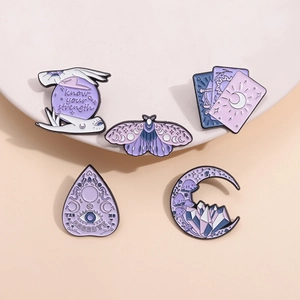 5-piece mystical purple enamel pin set with tarot cards, moth, and palmistry crystal motifs
