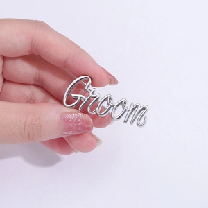 Silver Groom script letter brooch made of polished metal for wedding suit decoration