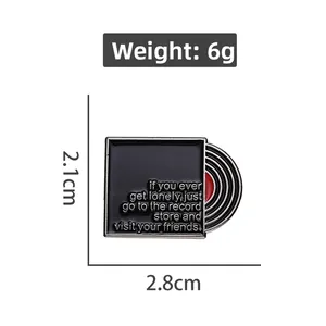 Detail of vinyl record enamel pin with dimensions 2.8cm by 2.1cm and weight 6g