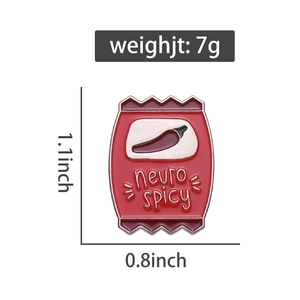 Macro view of a red neuro spicy enamel pin in a snack bag shape with dimension markings