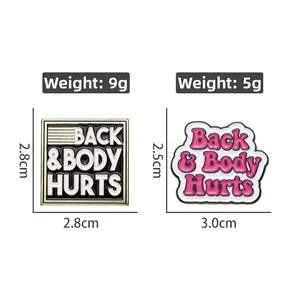 Detail view of BACK & BODY HURTS enamel pins with weight and size specifications