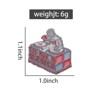 Detailed macro view of Monty Python DJ enamel pin with Tis But A Scratch text