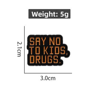 Detail view of enamel badge 'SAY NO TO KIDS' with dimensions and weight measurements