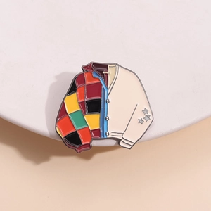 Creative enamel jacket brooch with colorful patchwork pattern and star details on white