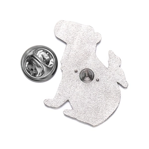 Detailed back view of a silver capybara brooch showing the pin and butterfly clutch