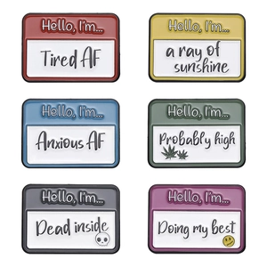 Set of 6 colorful enamel pins with humorous Hello I'm phrases and quirky illustrations
