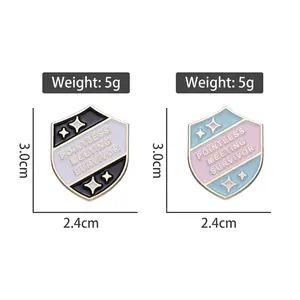 Shield enamel pins with Pointless Meeting Survivor text and star accents in two colors