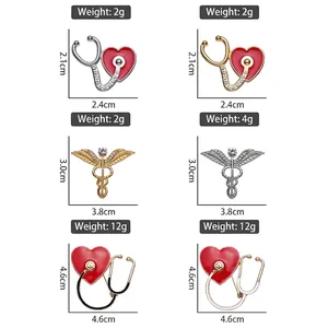 Size chart showing gold and silver stethoscope and caduceus brooch pins with measurements