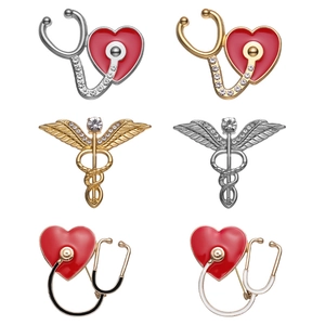 Set of crystal stethoscope and heart medical brooches in gold silver and black