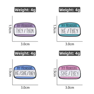 Macro detail of geometric enamel pins set with SHE HE THEY pronouns and metal edges