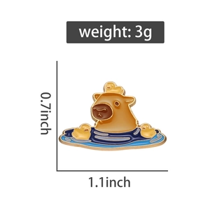 Detailed size view of a capybara and yellow ducks enamel pin with dimension markers