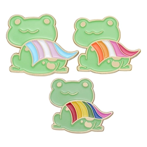 Three cute frog enamel pins with pride rainbow cloaks made of polished gold alloy