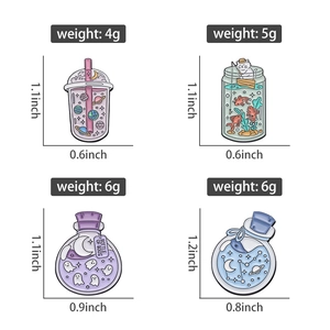 Detailed size and weight view of assorted cartoon enamel pins with cat and space designs