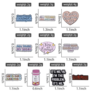 Detail showing various colorful enamel pins with mental health quotes and weight specs