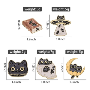Set of five black cat enamel pins featuring UFO, books, and skull designs with dimensions