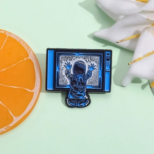 Geometric TV girl enamel pin with Poltergeist movie scene on mint green surface