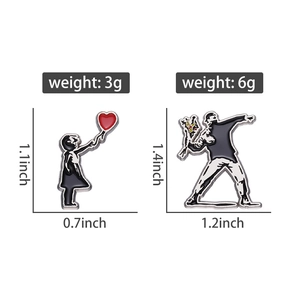Detail view of heart-shaped graffiti enamel pins with weight and size specifications