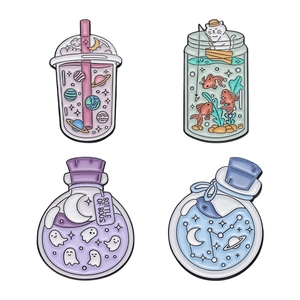Set of four cartoon enamel pins featuring space boba, cat fishing, and magic potion bottles