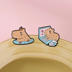 Creative Capybara enamel pins set with orange bath and laptop work designs