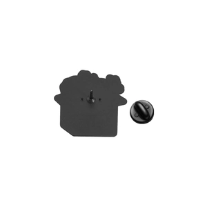 Detail view of the black metal enamel pin back with a secure rubber clutch fastener