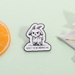 Funny goat enamel pin with GOAT TO BE KIDDING ME quote on a minimalist green background