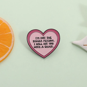 Pink heart enamel pin with funny quote I'M NOT THE BIGGER PERSON I WILL HIT YOU WITH A CHAIR