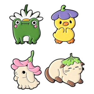 Set of four cute cartoon animal enamel pins featuring a frog, chick, rabbit, and cat