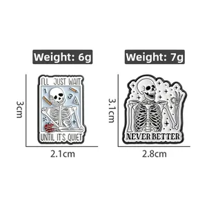 Detail view of skeleton pins with sarcastic slogans made of zinc alloy and white enamel
