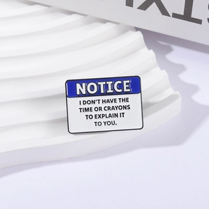 Funny blue and white notice enamel pin with humorous quote on a wavy display stand