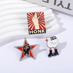 Funny cartoon goose and duck enamel pins set with HONK and SLAY text on white stand