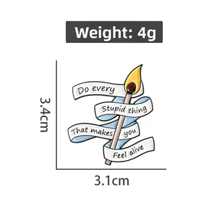 Detail view of cartoon match enamel pin showing 3.4cm height and 3.1cm width dimensions