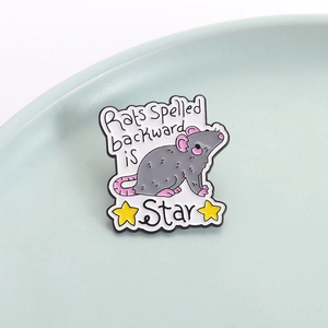 Cartoon rat enamel brooch with Rats Spelled Backward is Star slogan and yellow stars
