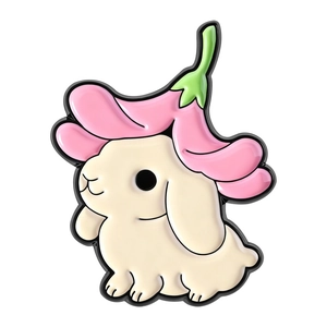 Detail of a cute bunny enamel pin wearing a pink flower petal hat and green stem