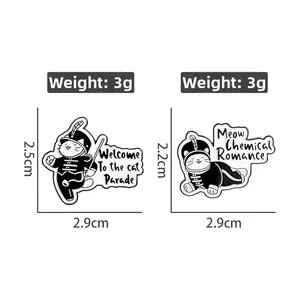 Detail of two black cat marching band enamel pins with dimensions and 3g weight info