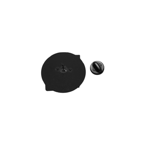 Detailed macro view of the black rubber clutch and butterfly pin back hardware