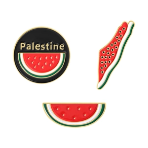 Three Palestine watermelon enamel pins with gold trim and creative artistic designs