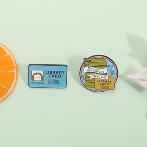 Library themed enamel pins set with library card design and cute hedgehog motif