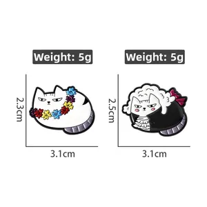 Detail of fat cat enamel pins featuring a flower crown and Mozart musician disguise style