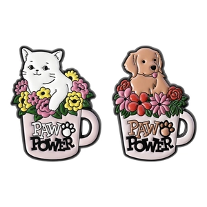 Cute enamel cat and dog pins in pink flower cups with PAW POWER text on white background