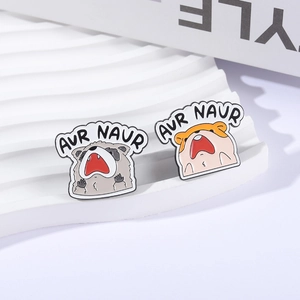 Funny enamel animal brooches featuring screaming raccoon and hamster with AUR NAUR text