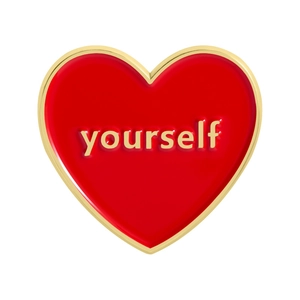 Minimalist red heart enamel pin with gold lettering yourself on a white background