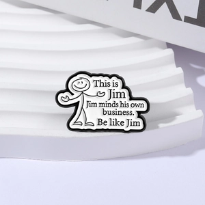 Funny Jim character enamel pin with humorous quote on a white decorative platform