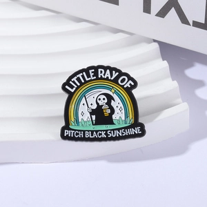 Gothic enamel pin featuring Grim Reaper with coffee and rainbow on a white wavy pedestal