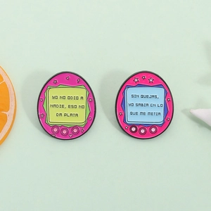 Retro handheld game console enamel pins with Spanish funny quotes for bags and clothes