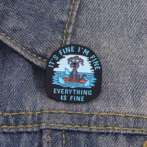 Enamel pin of a dog surfing with sharks, featuring the quote Everything Is Fine